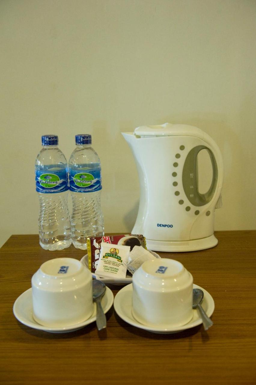 Catur Adi Putra Hotel Denpasar Oda fotoğraf