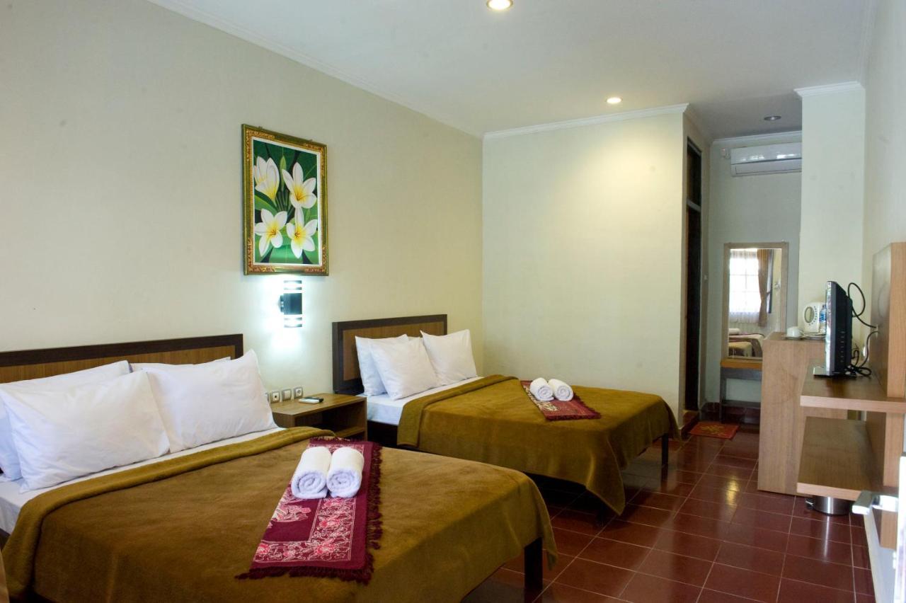 Catur Adi Putra Hotel Denpasar Oda fotoğraf