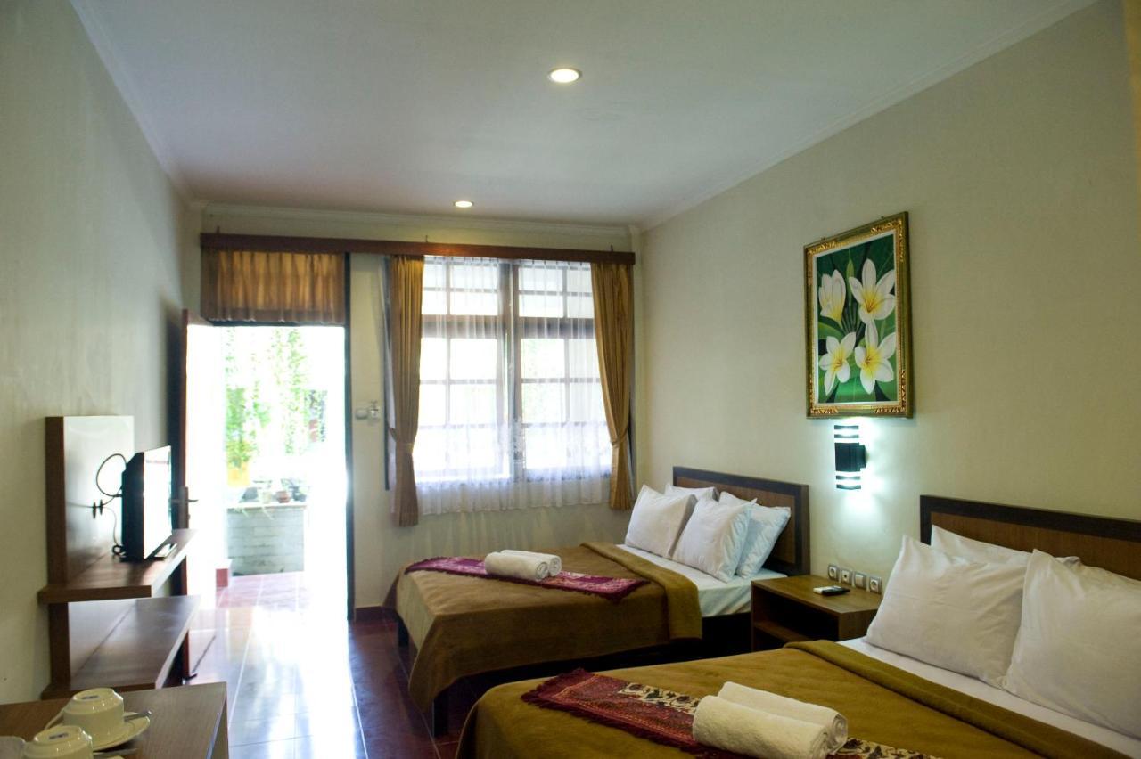 Catur Adi Putra Hotel Denpasar Oda fotoğraf